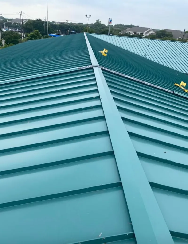 Green commercial metal roof ridge and valley for Metal Roof Repair in Bothell